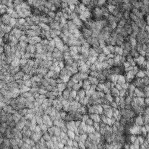 LK Hjelle Siesta Ovis Fußhocker – Natur/Schaffell Skandinavisches Grau