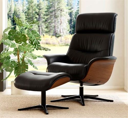 IMG Comfort Space 5300 Sessel mit Hocker – schwarz pulverbeschichtete Beine.